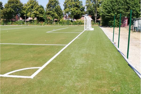 Aanleg kunstgras voetbalveld - Sportinfrabouw NV